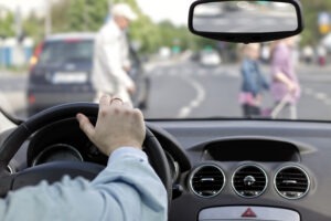 A distracted driver is about to injure pedestrians on a crosswalk. A pedestrian accident victim can help hold the responsible party accountable.