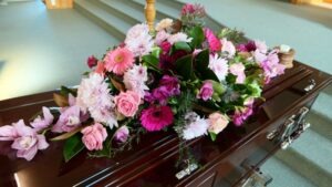 close-up on flowers on a casket